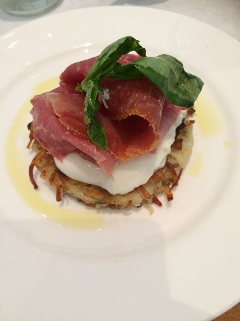 potato pancake topped with prosciutto and burrata cheese