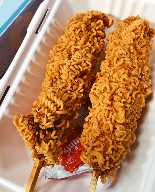 korean style hot dogs crusted with ramen noodles